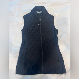 Women’s Athleta black zip up vest, size XXS.